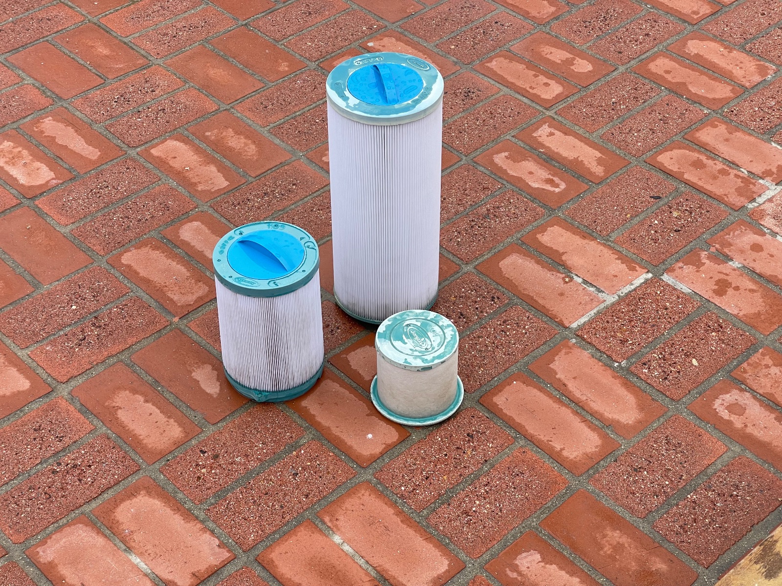 Professional spa filter cleaning service across multiple filter sizes — The Cold Standard
